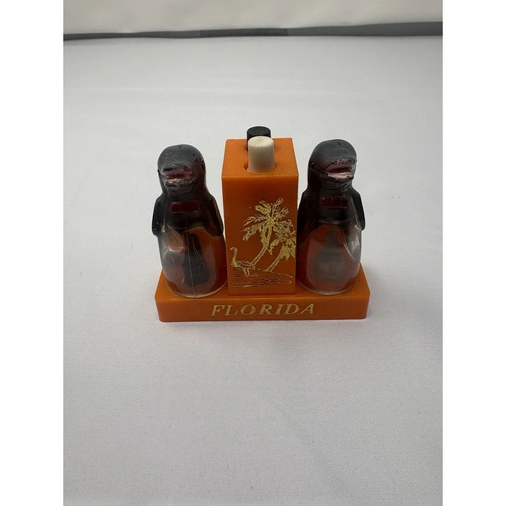Vintage Plastic Dolphin Dual Salt And Pepper Shaker Mechanical Set Florida Retro